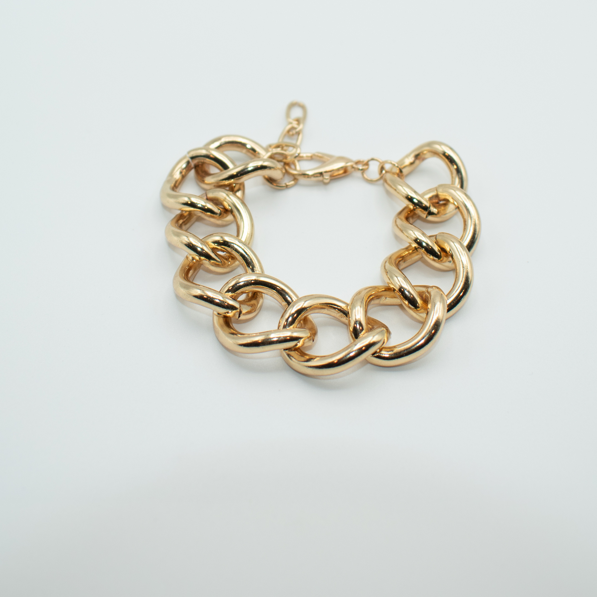 Gold Plated Bracelet Chunky Cable Chain Design Adjustable Lobster Clasp Closure Approx. 6.5in. Extends to 9in 1.5oz Imported Lead Compliant&nbsp;  You will receive a free: Storage box or bag and cleaning cloth with&nbsp;