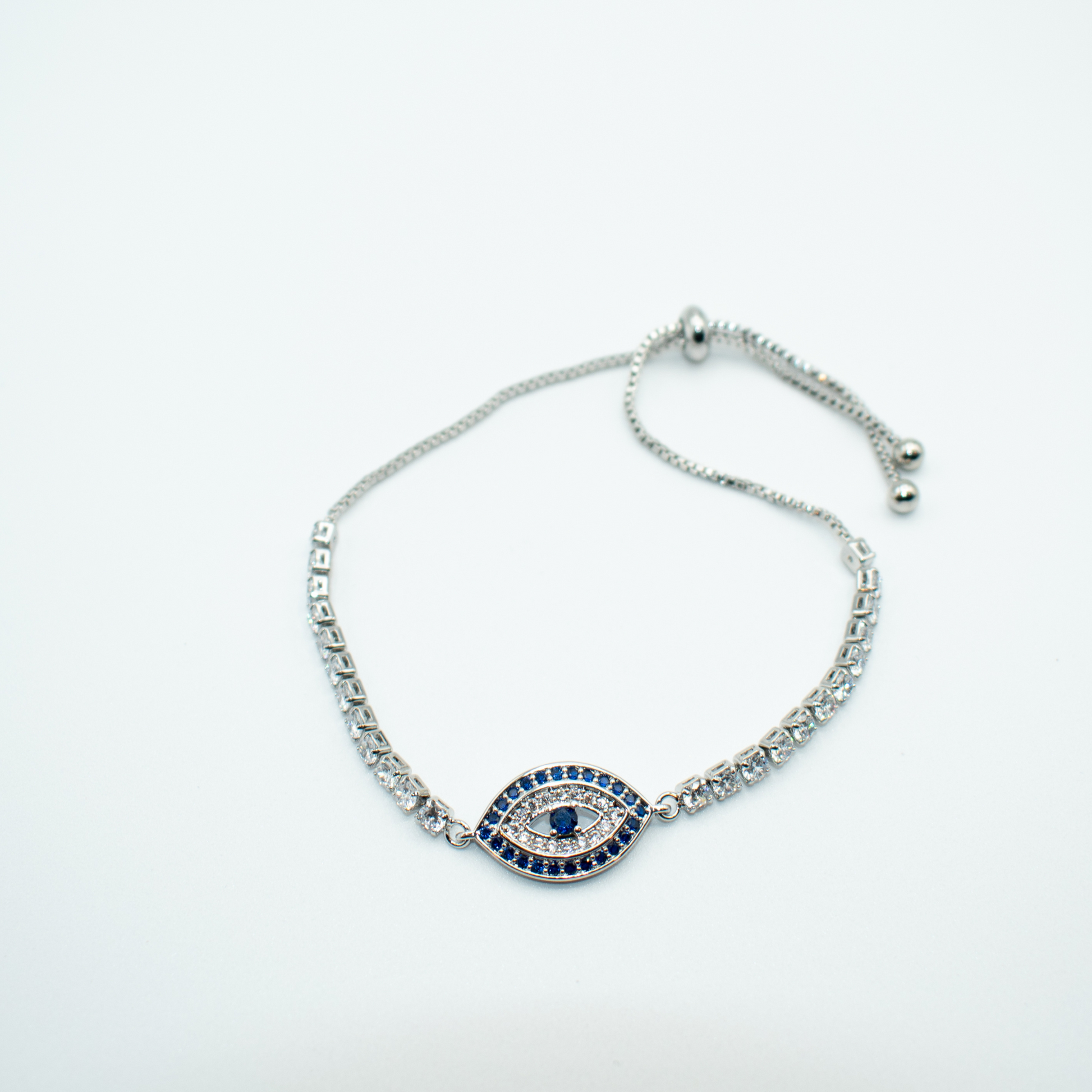 PRODUCT DETAIL  Crystal Rhinestone Cup Chain Silver Rhinestone Evil Eye Charm Adjustable 0.3oz Imported Lead Compliant  You will receive a free: Storage box or bag and cleaning cloth with your order.