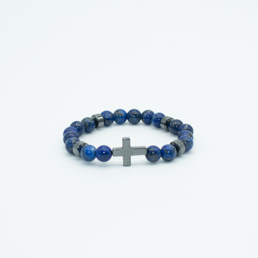 PRODUCT DETAILS  8mm&nbsp;Sodalite Beads Gun Metal Cross Stretch&nbsp; 7.5 Inches 1.2 oz Handmade in USA We use premium durable materials and stones in our jewelry. All pieces may vary slightly in color, shape, and size. Please measure your wrist before you make your purchase for an accurate fit. Please leave a message if you need a different size.  You will receive a free: Storage box or bag and cleaning cloth with your order