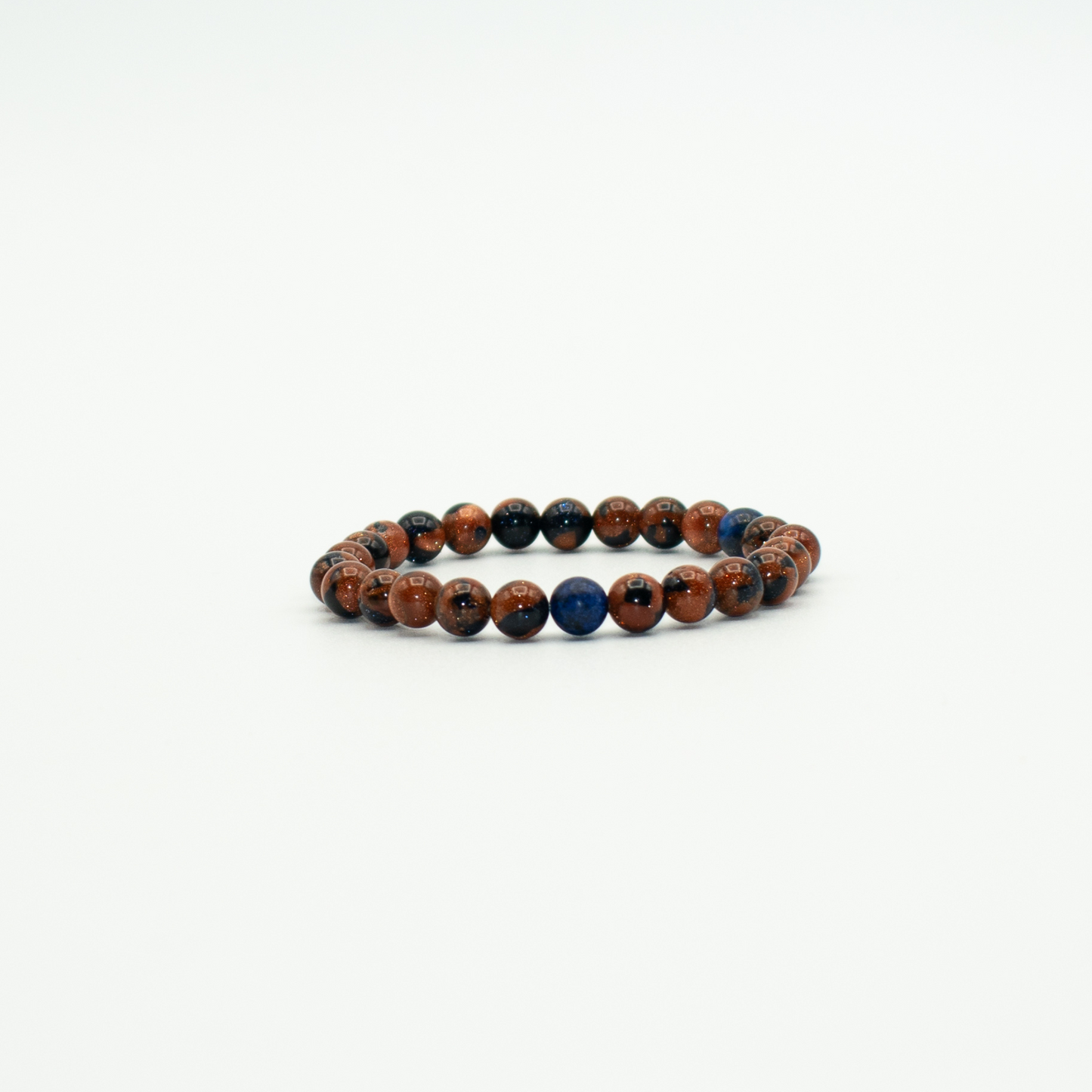 PRODUCT DETAILS  8mm Blue Sodalite and Brown Goldstone Stretch&nbsp; 7.5 Inches Blue/Brown 0.8 oz Handmade in USA We use premium durable materials and stones in our jewelry. All pieces may vary slightly in color, shape, and size. Please measure your wrist before you make your purchase for an accurate fit. Please leave a message if you need a different size.  You will receive a free: Storage box or bag and cleaning cloth with your order.