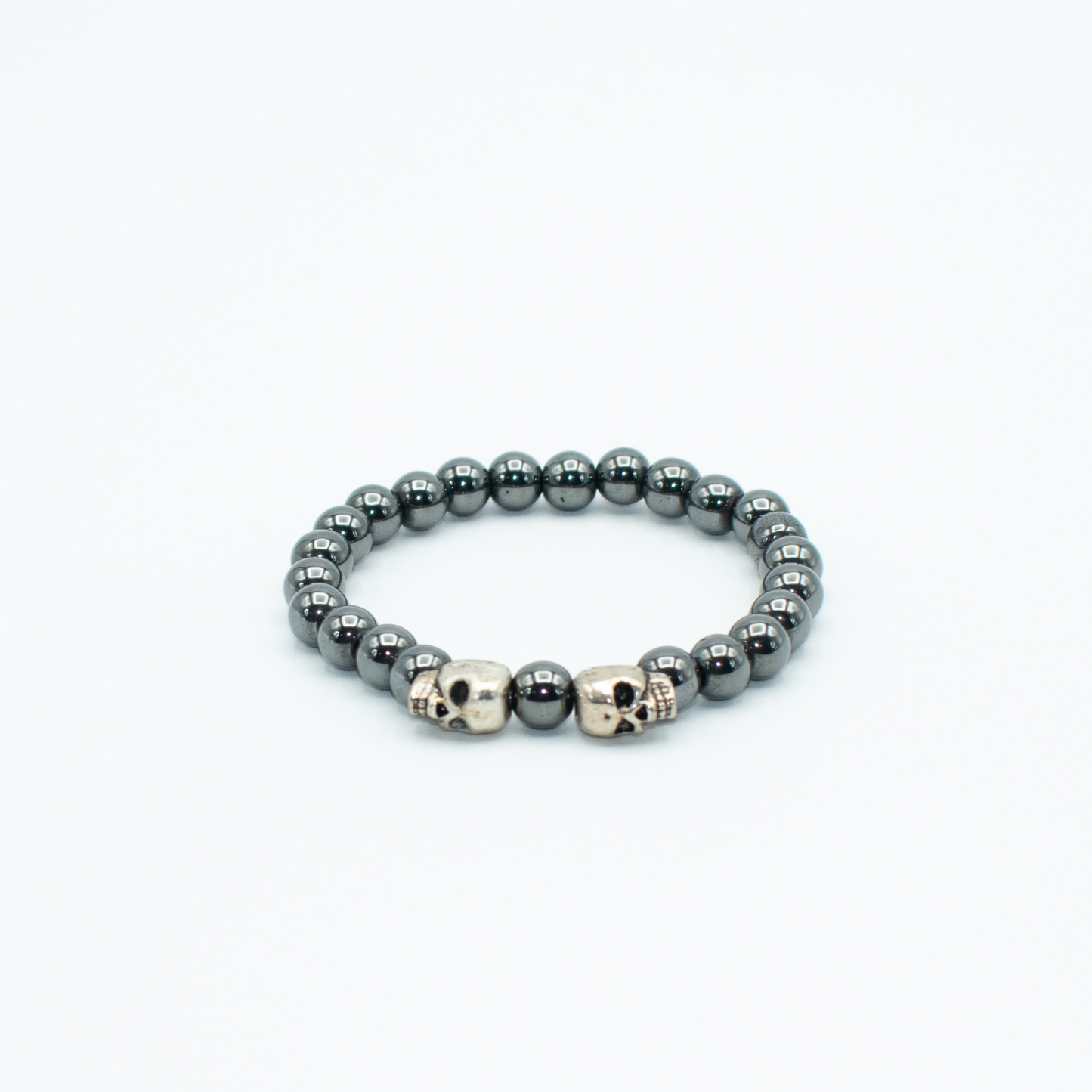 Gunmetal Hematite Stretch Beaded Bracelet With Skull Charms