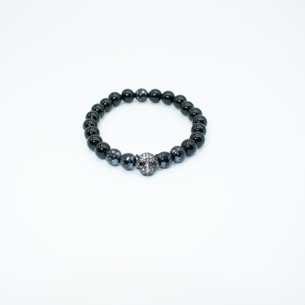 PRODUCT DETAILS  8 mm Black Faceted Onyx Stones Rhinestone Panther Charm Stretch 7.5 inches 0.7 oz Handmade in USA We use premium durable materials and stones in our jewelry. All pieces may vary slightly in color, shape, and size. Please measure your wrist before you make your purchase for an accurate fit. Please leave a message if you need a different size. You will receive a free: Storage box or bag and cleaning cloth with this purchase.&nbsp;