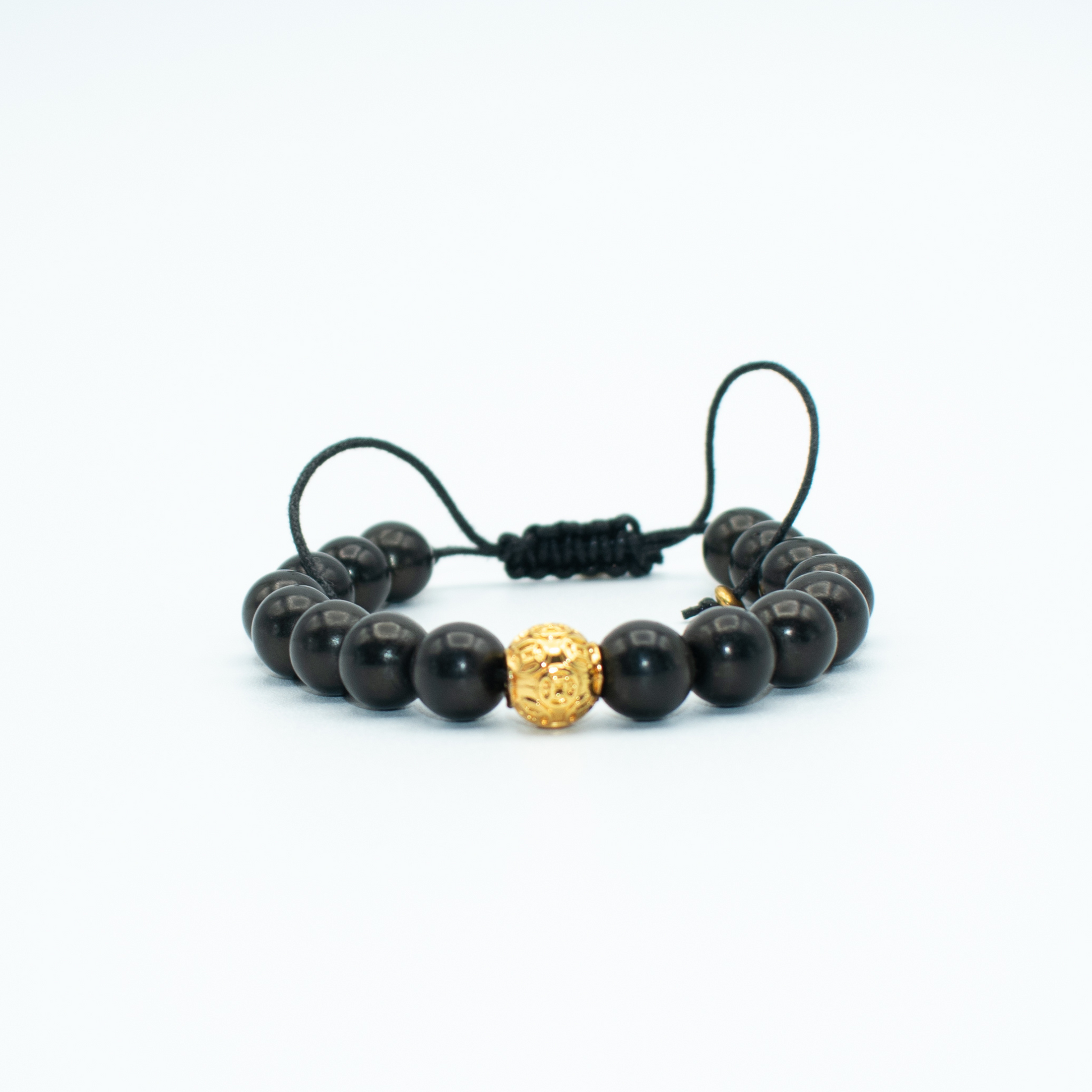 PRODUCT DETAILS  10mm Howlite Stones 10mm Gold Plated Mantra Charm Black Adjustable 0.9 oz Handmade in USA We use premium durable materials and stones in our jewelry. All pieces may vary slightly in color, shape, and size. Please measure your wrist before you make your purchase for an accurate fit.&nbsp;  You will receive a free: Storage box or bag and cleaning cloth with your order.&nbsp;